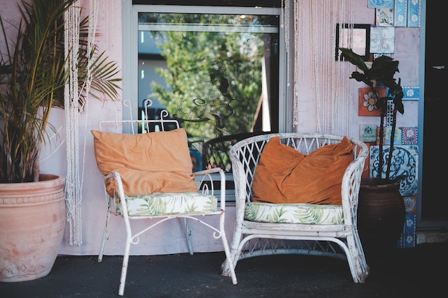 Comfy balcony chairs as a way to make your rental feel like home.