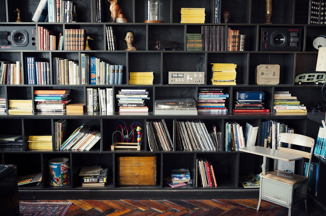 Using floor-to-ceiling shelving as one of the creative storage solutions for your rental home