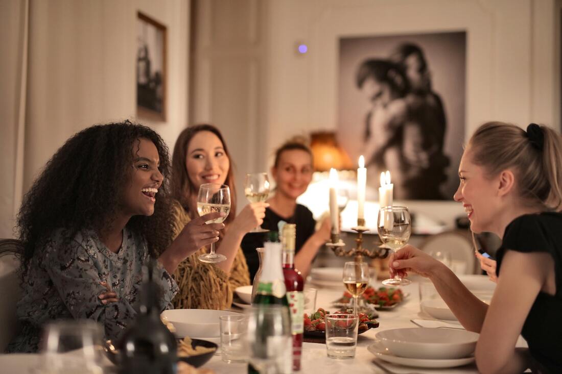 Women having a dinner party