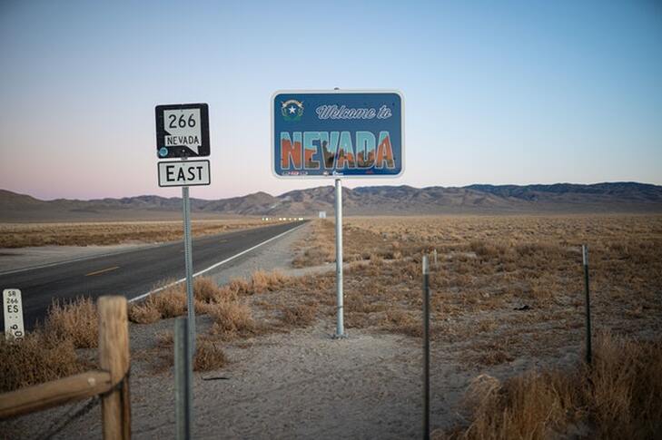 A street sign saying Welcome to Nevada